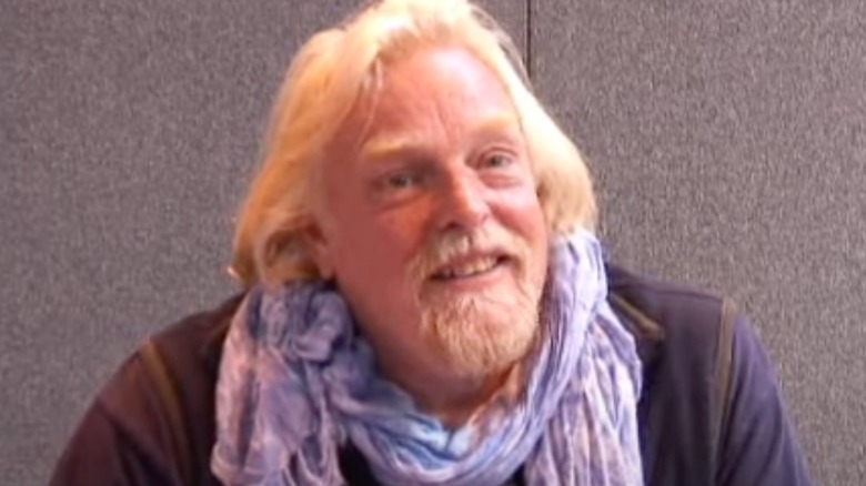 Gavan O'Herlihy wearing purple scarf