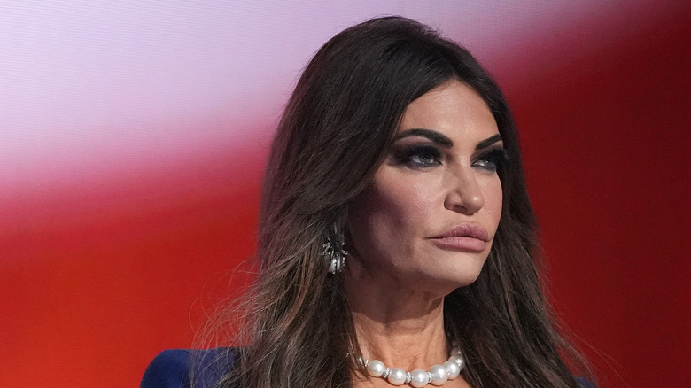 Kimberly Guilfoyle stands onstage in 2024