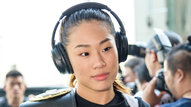 Angela Lee with headphones