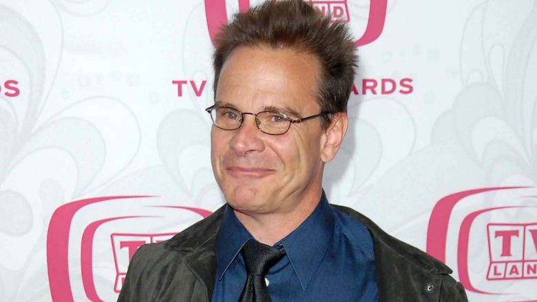 Peter Scolari attends an event