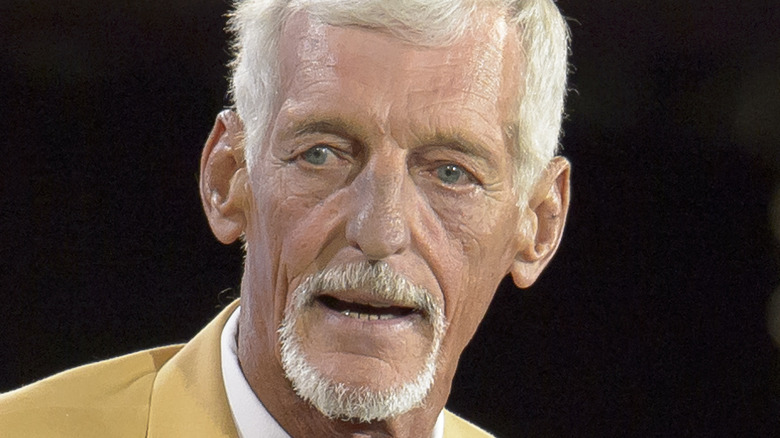 Ray Guy giving a speech 