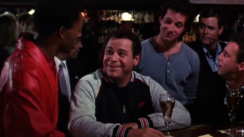 Art Metrano smiling with the cast of Police Academy