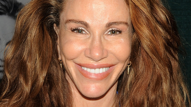 Tawny Kitaen smiling