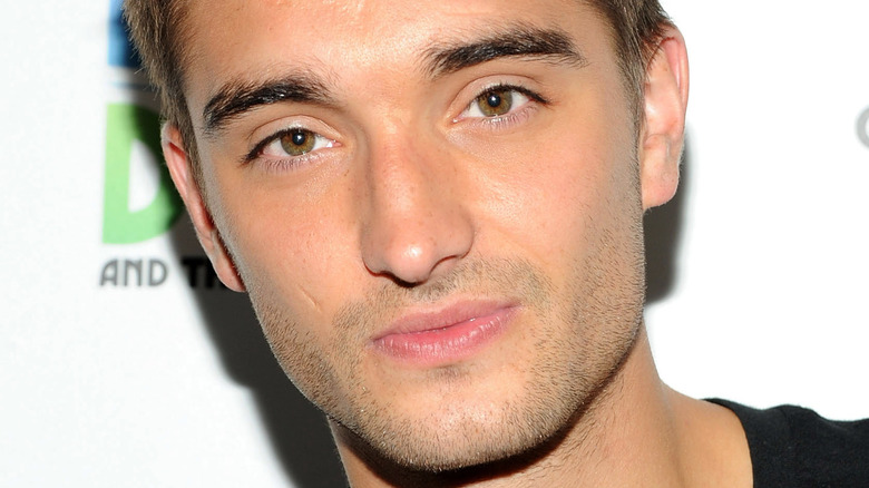 Tom Parker gazing in front