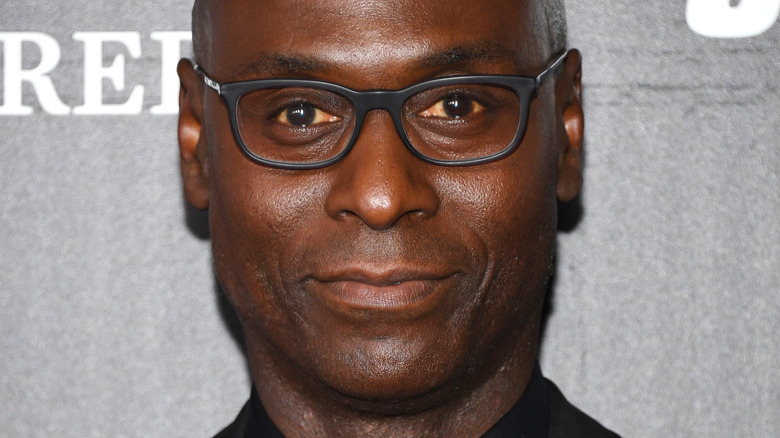 Lance Reddick red carpet 