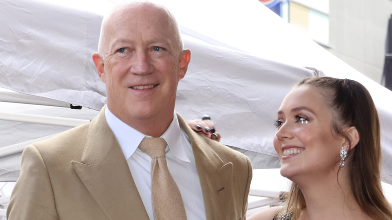 Billie Lourd smiling at Bryan Lourd