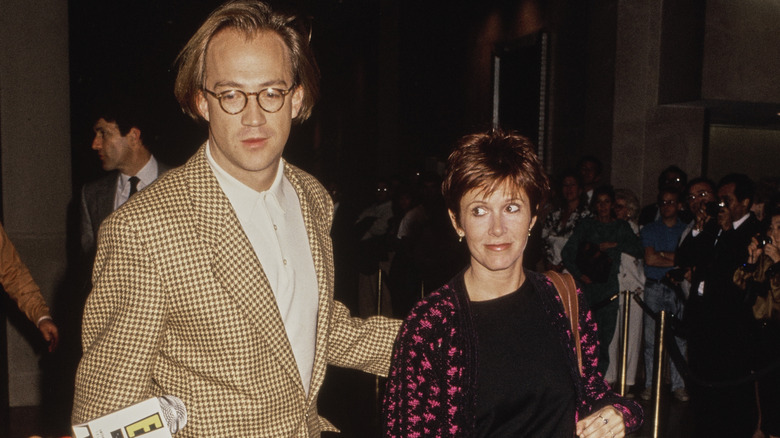 Carrie Fisher and Bryan Lourd walking