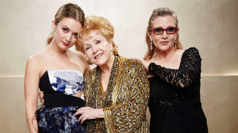 Carrie Fisher, Debbie Reynolds, and Billie Lourd posing