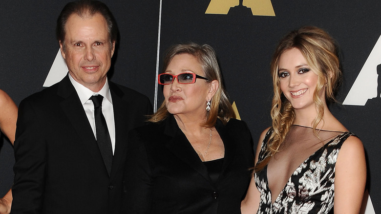 Carrie Fisher, Billie Lourd, and Todd Fisher posing