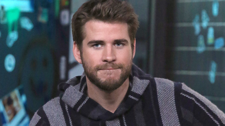 Liam Hemsworth looking serious
