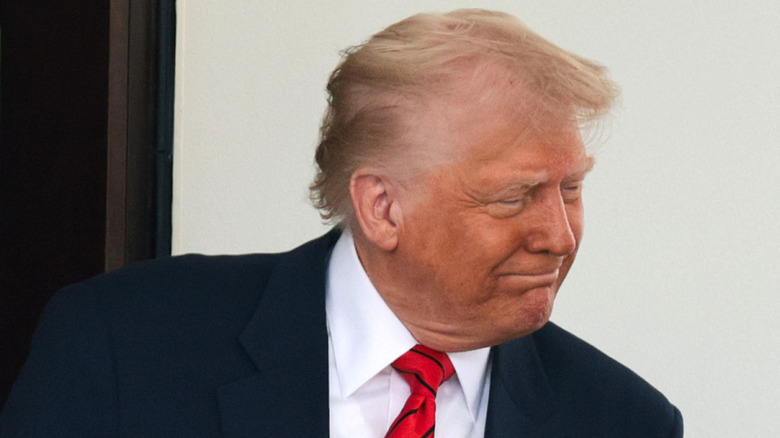 Donald Trump smiles at the Canadian Prime Minister.