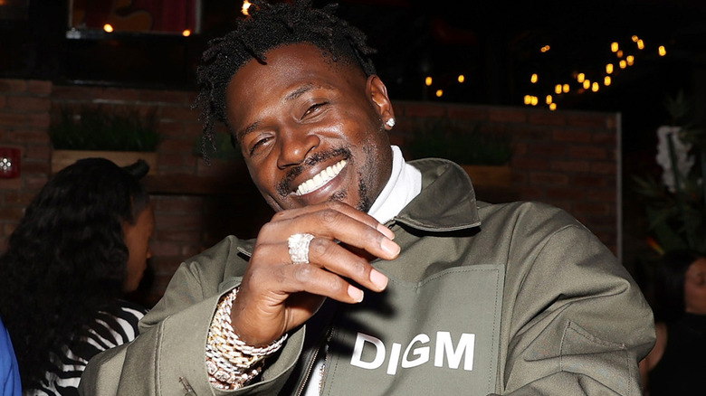 Antonio Brown posing for a photo in a DIGM