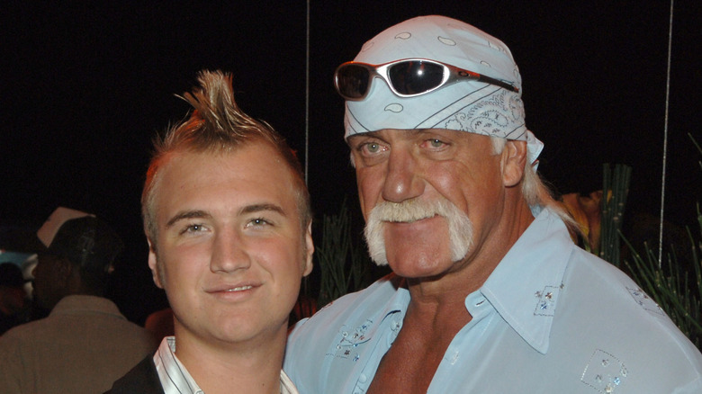 Hulk Hogan posing with son Nick Hogan