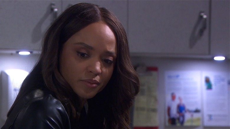 Sal Stowers as Lani, looking down