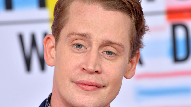 Macaulay Culkin posing