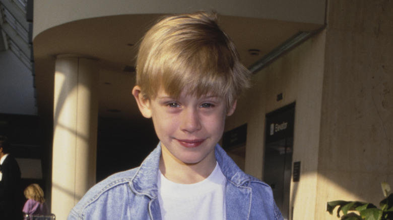 Macaulay Culkin as a kid, smiling