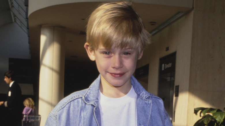 Macaulay Culkin as a kid, smiling