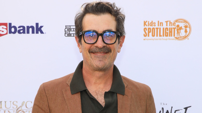 Ty Burrell on red carpet with mustache
