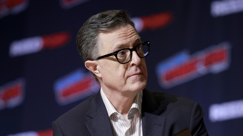 Stephen Colbert onstage during event