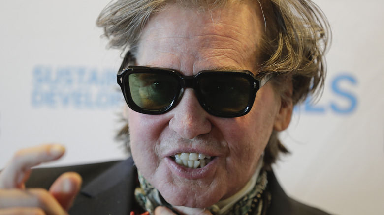 Val Kilmer wearing sunglasses