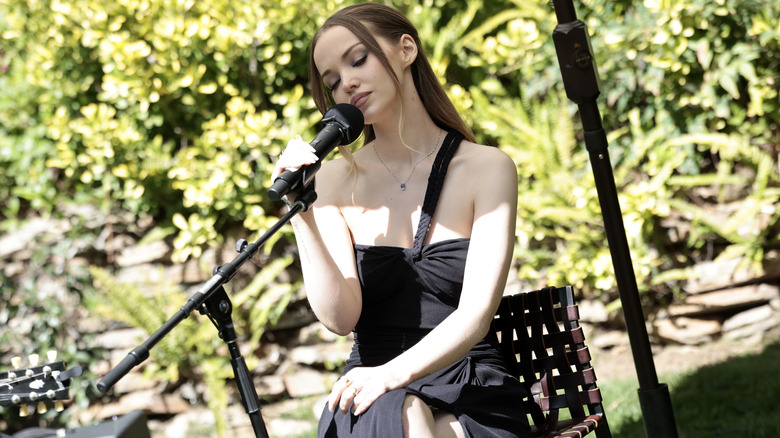 Dove Cameron performing at an Academy Awards luncheon.