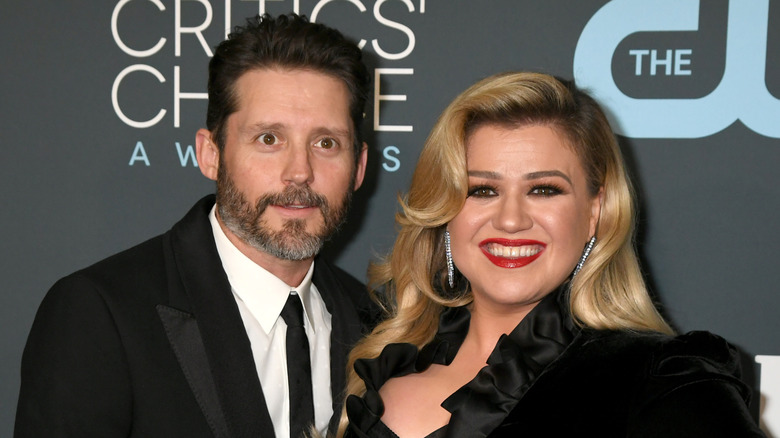 Kelly Clarkson and Brandon Blackstock pose in 2020