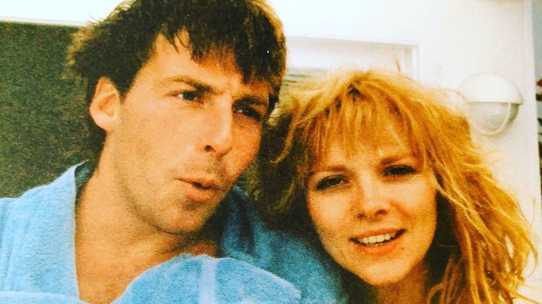 Kim Cattrall smiling with brother Chris Cattrall