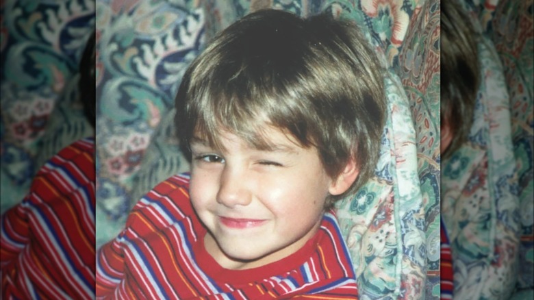 Young Liam Payne winks at the camera