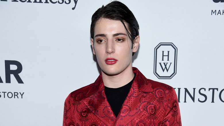 Harry Brant wearing red lipstick
