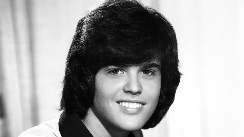 Donny Osmond smiles black and white