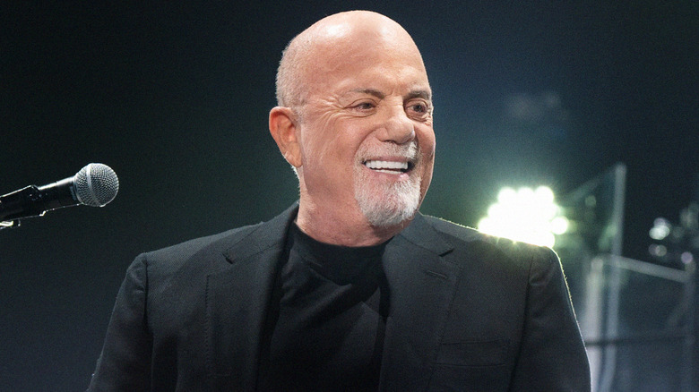 Billy Joel smiling on stage