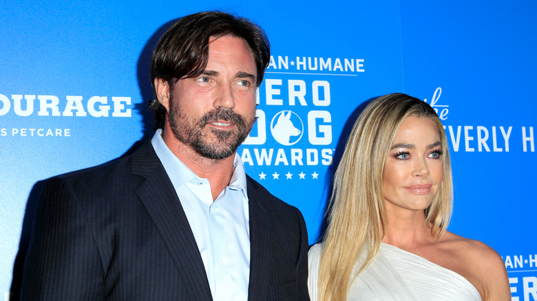 Aaron Phypers and Denise Richards posing