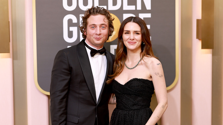 Jeremy Allen White and Addison Timlin posing