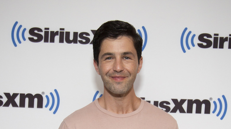 Josh Peck posing at Sirius XM