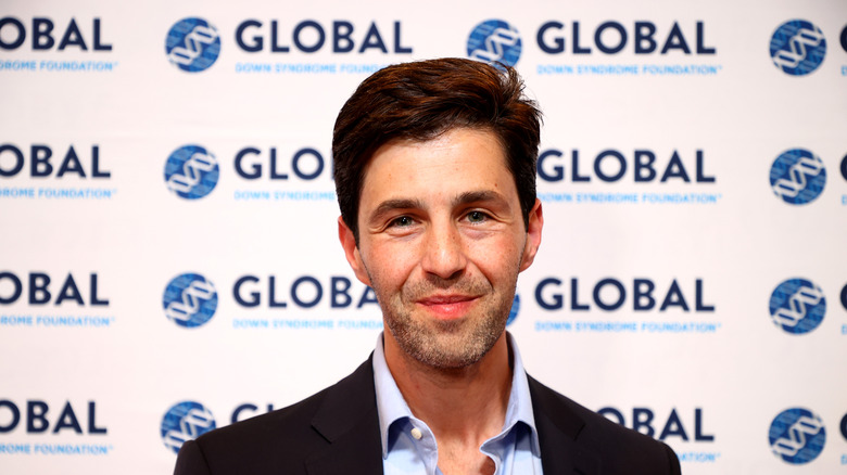 Josh Peck posing at an event
