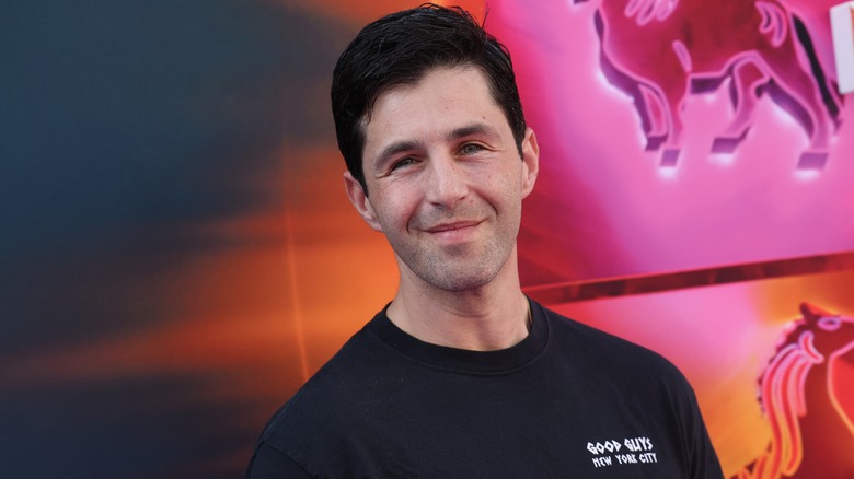 Josh Peck posing at an event