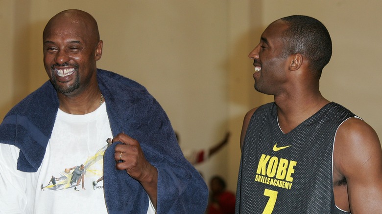Joe Bryant and Kobe Bryant laughing