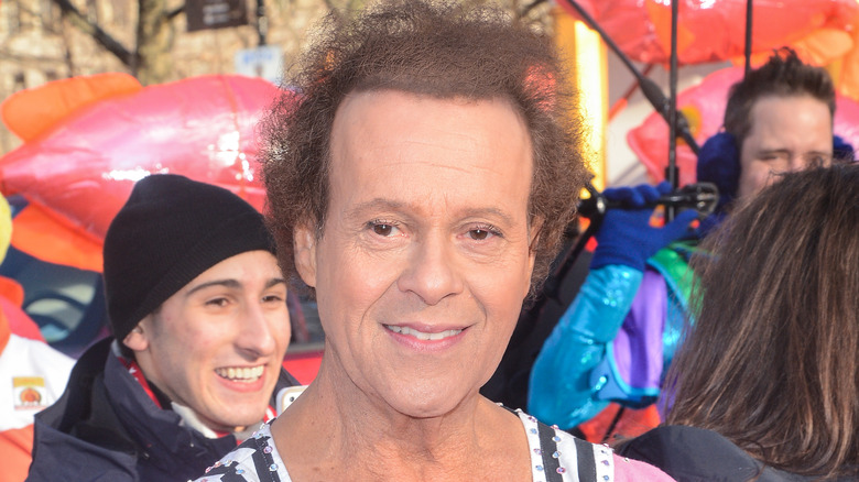 Richard Simmons in pink shirt