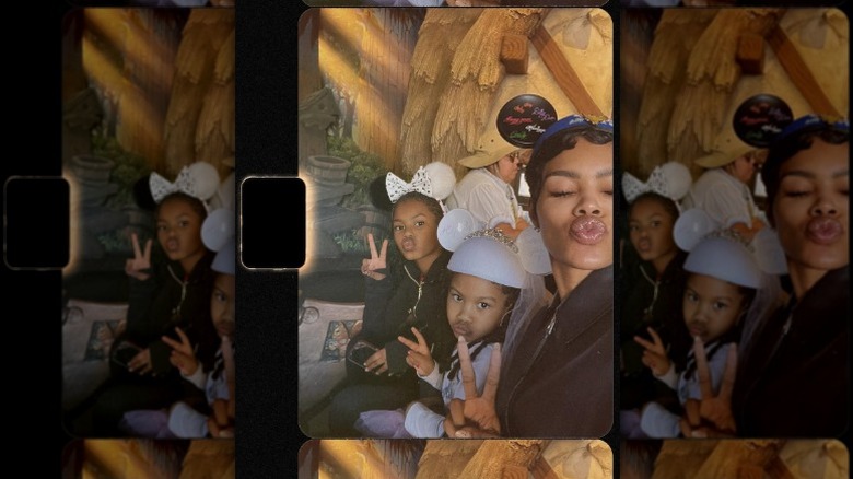Teyana Taylor poses with her daughters
