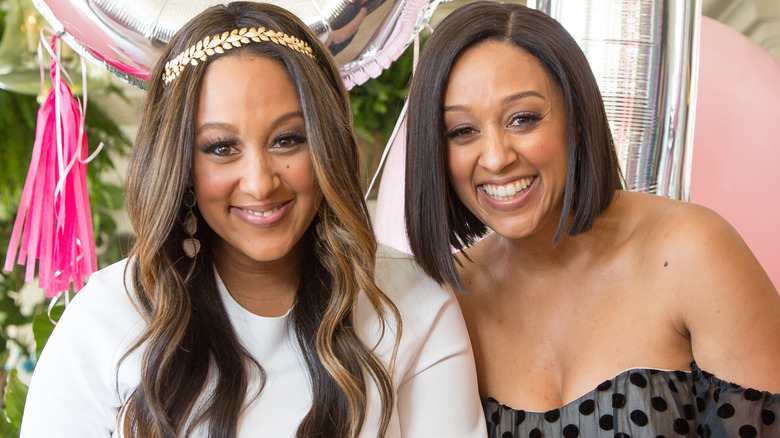 Tamera and Tia Mowry smiling