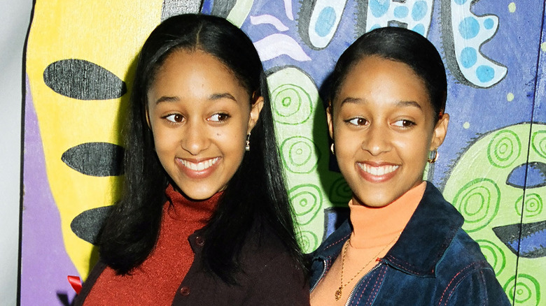 Tamera and Tia Mowry grinning
