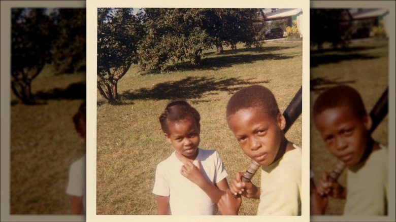 Young Michelle Obama with Craig Robinson