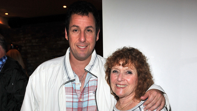 Adam and Judy Sandler pose together