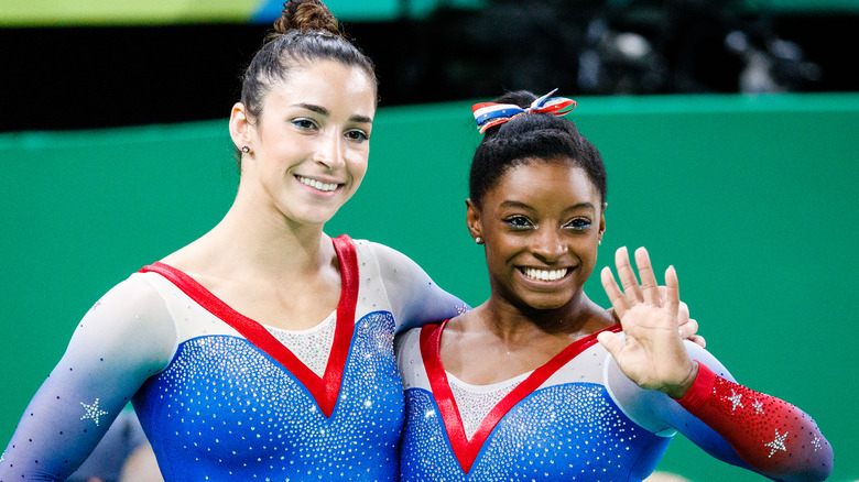 Aly Raisman and Simone Biles smiling