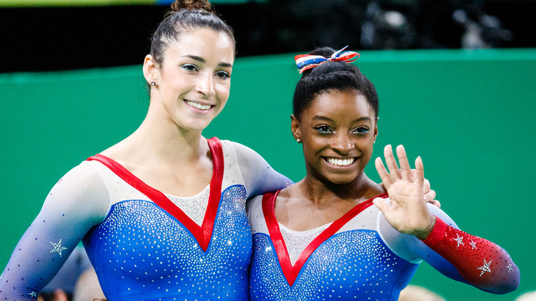Aly Raisman and Simone Biles smiling
