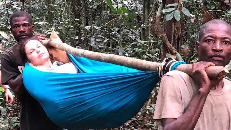 Ashley Judd being carried out of rain forest 2021