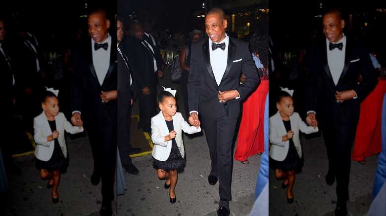Blue Ivy Carter and Jay-Z arrive at the CFDA Awards