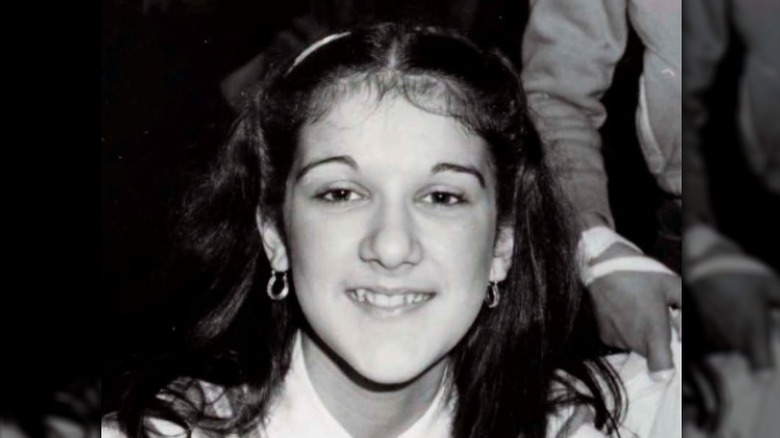 Celine Dion in a striped shirt