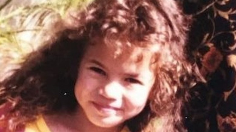 Child Chrissy Teigen smiling