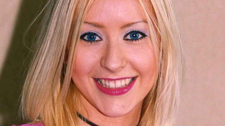 A young Christina Aguilera smiling 